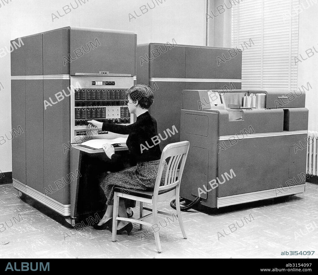 New York:  1954. IBM 650 Data Processing System, the first mass produced computer. IBM sold 450 of them the first year. Acessories include up to 4 disk units, each holding 6 Mb of data..