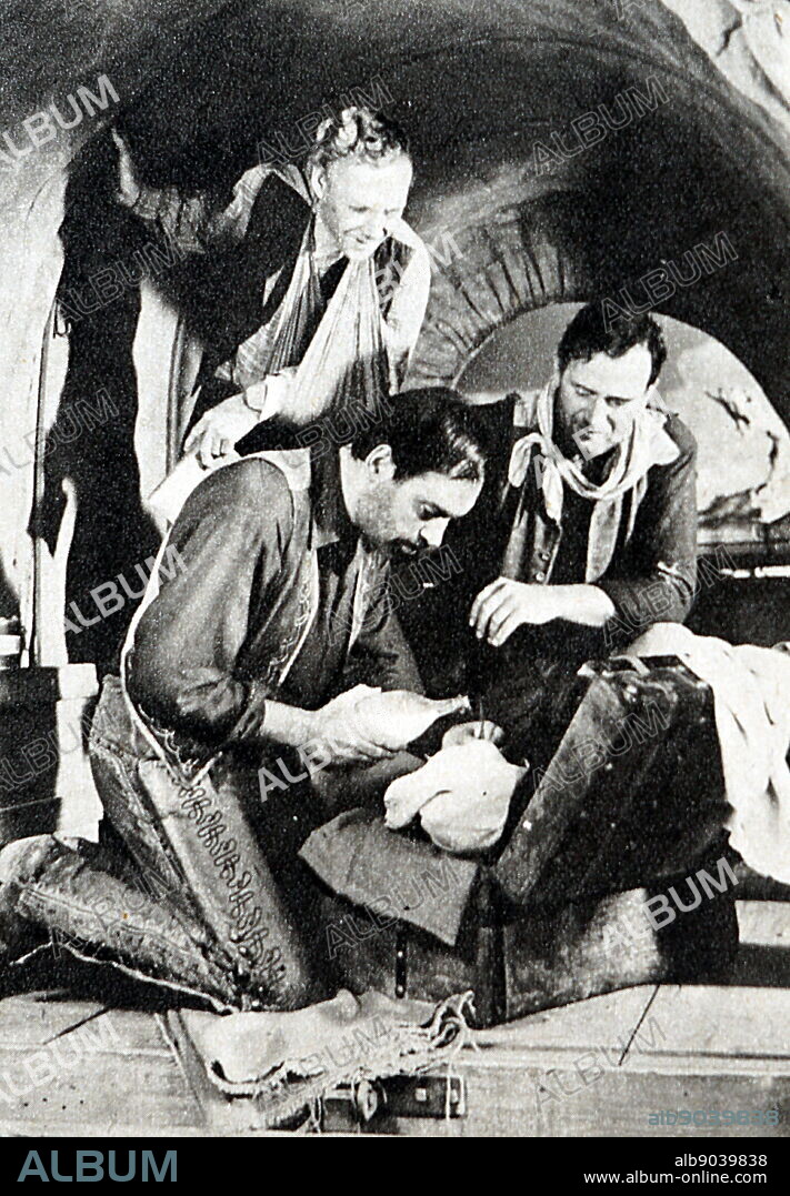Film still from '3 Godfathers' starring John Wayne, Harry Carey Jr., Pedro Armendariz, and Mildred Natwick.