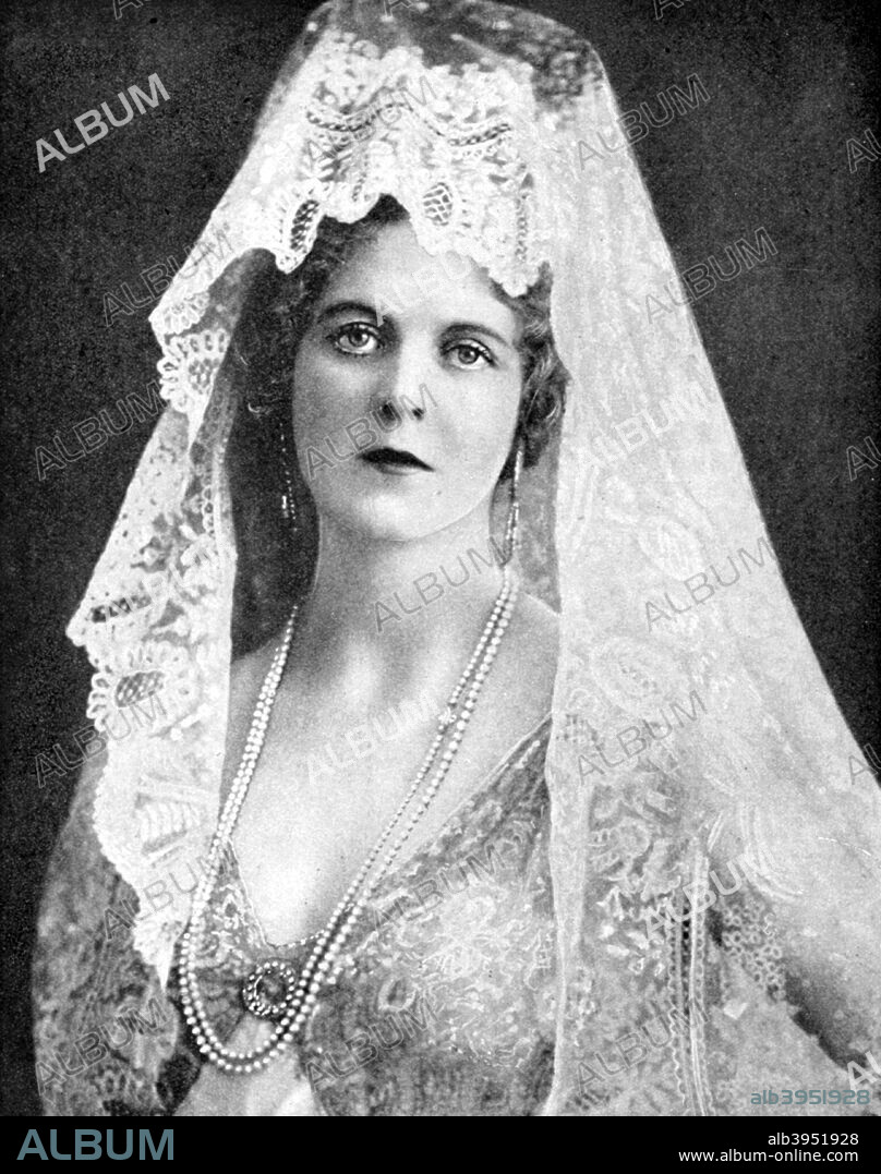 Woman wearing a lace mantilla, Andalusia, Spain, 1936. From Peoples of the World in Pictures, edited by Harold Wheeler, published by Odhams Press Ltd (London, 1936).
