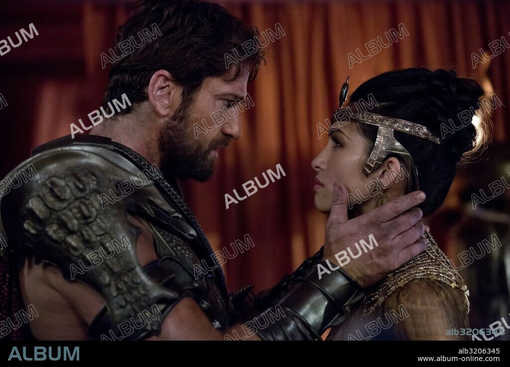 ELODIE YUNG and GERARD BUTLER in GODS OF EGYPT, 2016, directed by ALEX PROYAS. Copyright CONCORDE CLOCK CINEMA/SUMMIT ENT/THUNDER ROAD PICTURES.