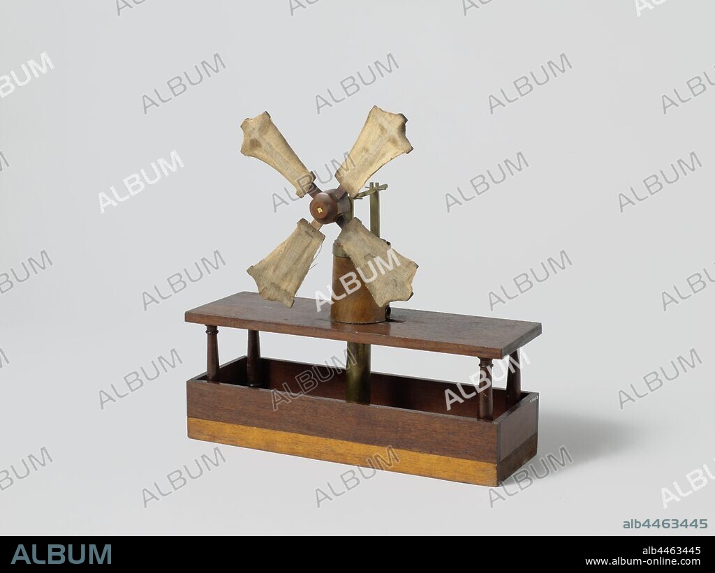 Model of a Wind-Driven Pump, Model of a pump driven by windmill vanes, in two-story frames. The lower floor is a container in which the pump pipe is located, which has a drain pipe at the upper floor. The pump buckets are simple metal valves, just like the pump pistons that are connected to a crank with a pump rod, in one model, the top of the pump tube is closed with a wooden plug that ensures the vertical movement of the pump rod. The crankshaft is driven by a four mill blades, crankshaft and wicks are mounted on a wooden cylinder with a metal ring, so that the whole unit can be turned in the wind direction., anonymous, 1788 and/or 1827, wood (plant material), brass (alloy), textile materials, paper, model: h 31.5 cm × w 32 cm × d 11.2 cm packaging capsule: h 39.5 cm × w 39.5 cm × d 38.5 cm.