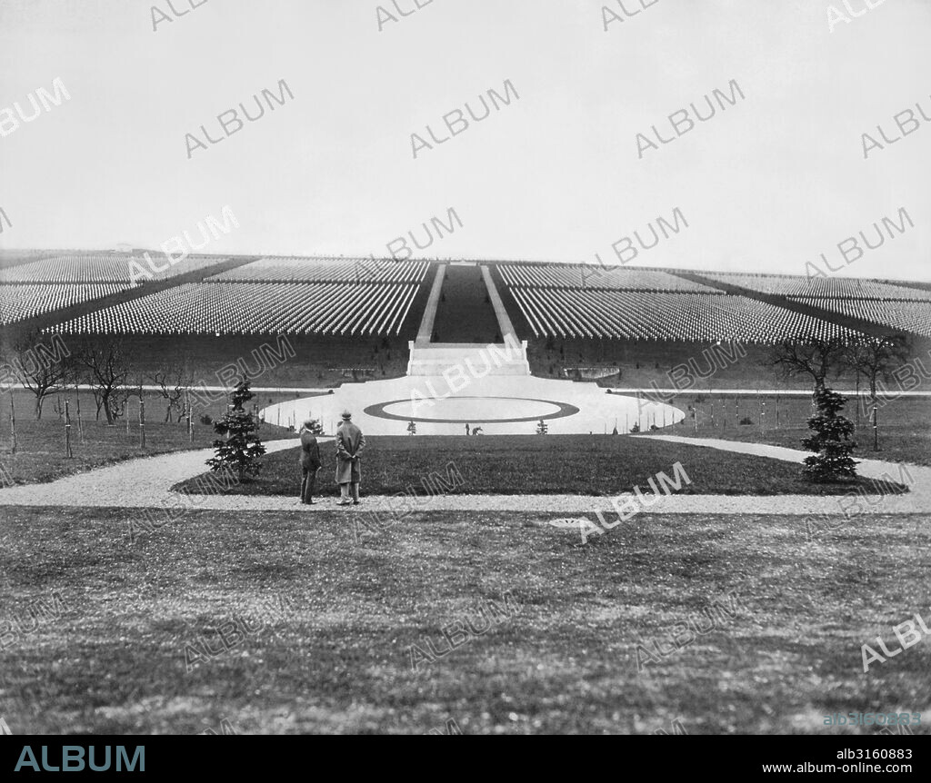 Romagne, France: April 15, 1927 Two men view the Meuse-Argonne American Cemetery where 16,000 Americans were buried in the aftermath of World War I.