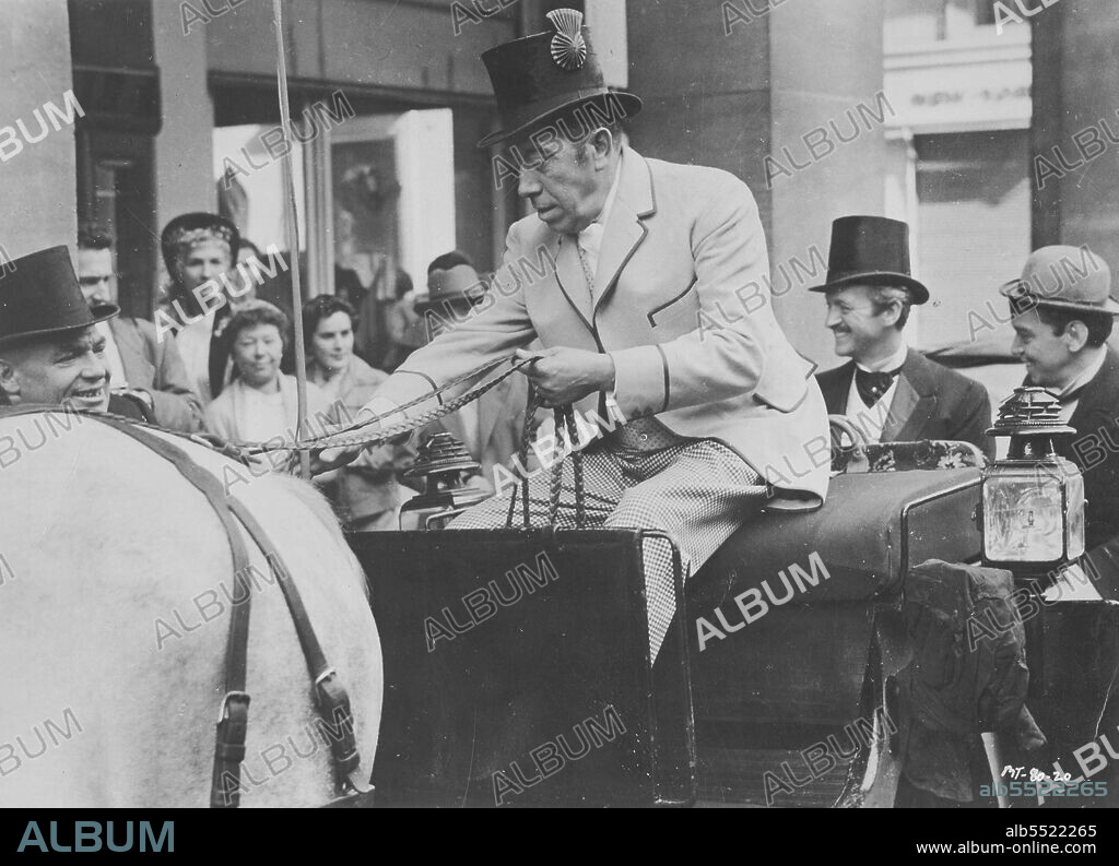 CANTINFLAS, DAVID NIVEN, FERNANDEL and JAMES MASON in AROUND THE WORLD IN EIGHTY DAYS, 1956, directed by MICHAEL ANDERSON. Copyright UNITED ARTISTS.
