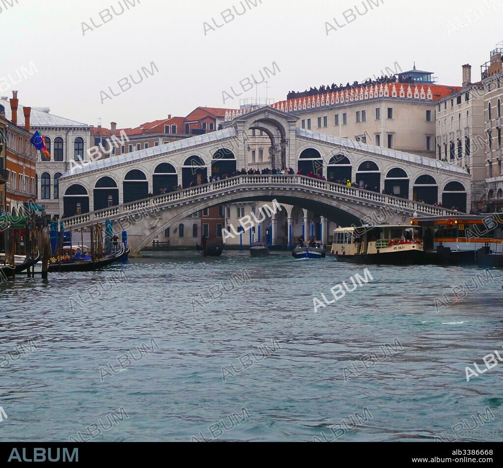 The Rialto Bridge (Ponte di Rialto), spanning the Grand Canal in Venice, Italy. It is the oldest bridge across the canal. The present stone bridge was designed by Antonio da Ponte, was finally completed in 1591.