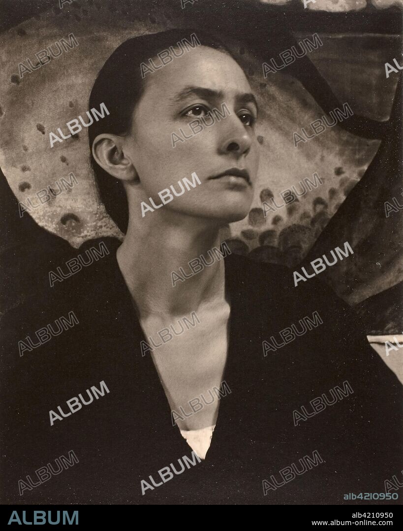 Georgia O'Keeffe. Alfred Stieglitz; American, 1864-1946. Date: 1918. Dimensions: 24.5 × 20.1 cm (image); 25.3 × 20.2 cm (paper). Platinum print. Origin: United States.