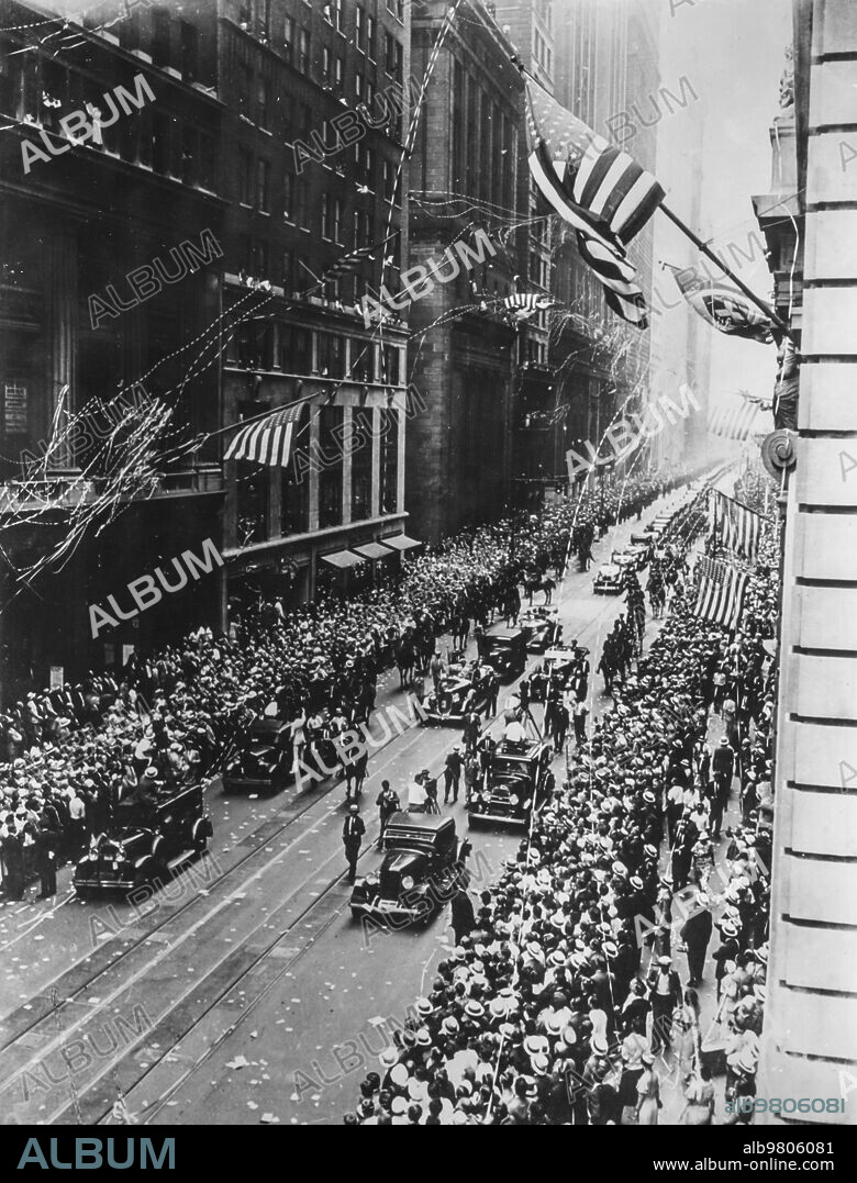 21th july 1933 general italo balbo and his colleagues drive in triumph along lower broadway to nyc.