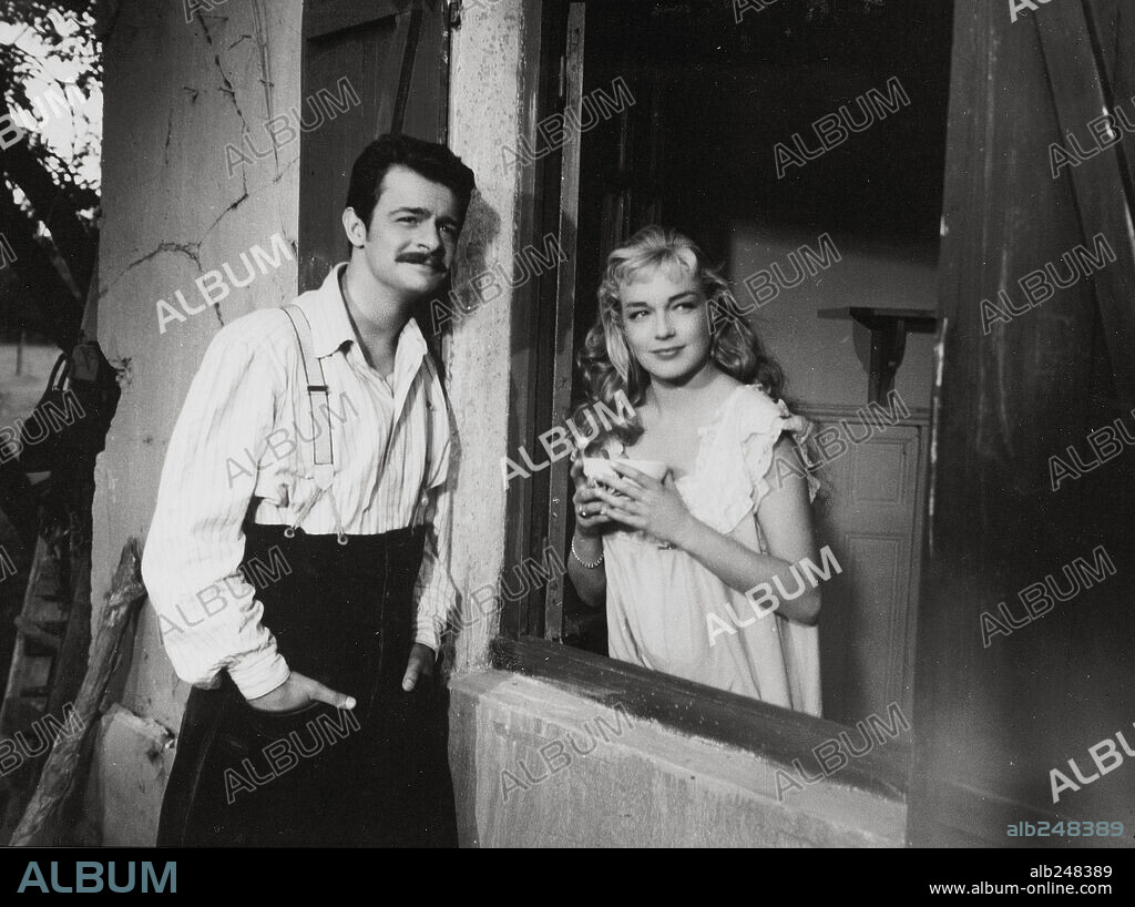 SERGE REGGIANI and SIMONE SIGNORET in GOLDEN HELMET, 1952 (CASQUE D'OR), directed by JACQUES BECKER. Copyright SPEVA FILMS/PARIS FILM.