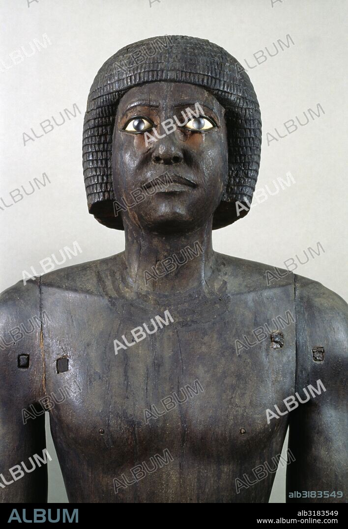 Male bust, 2475 BC, wooden statue from the Necropolis of Saqqara. Egyptian Civilisation, Old Kingdom, Dynasty V.