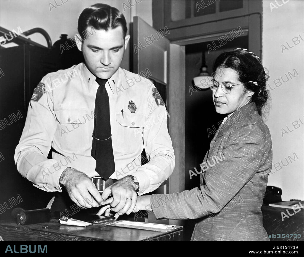 Montgomery, Alabama:  1956. Mrs. Rosa Parks, a Negro seamstress, being fingerprinted after her refusal to move to the back of a bus to accomodate a white passenger touched off the bus boycott in Montgomery, Ala.