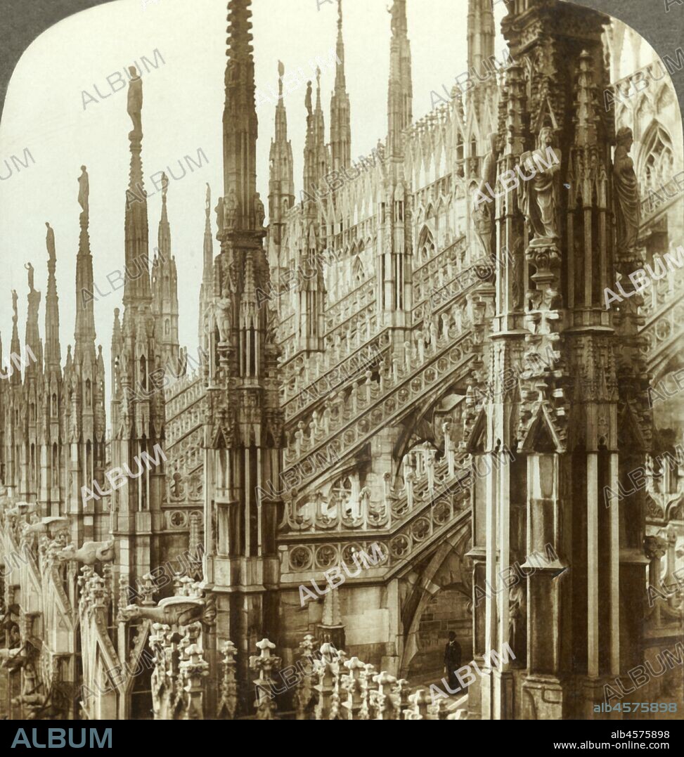 'The Cathedral of Milan - up among its myriad spires, Italy', c1909. Milan Cathedral took nearly six centuries to complete, building work began in 1387, led by Simone da Orsenigo.  To be viewed on a Sun Sculpture stereoscope made by Underwood & Underwood. [The Rose Stereograph Company, Melbourne, Sydney, Wellington & London, c1909].