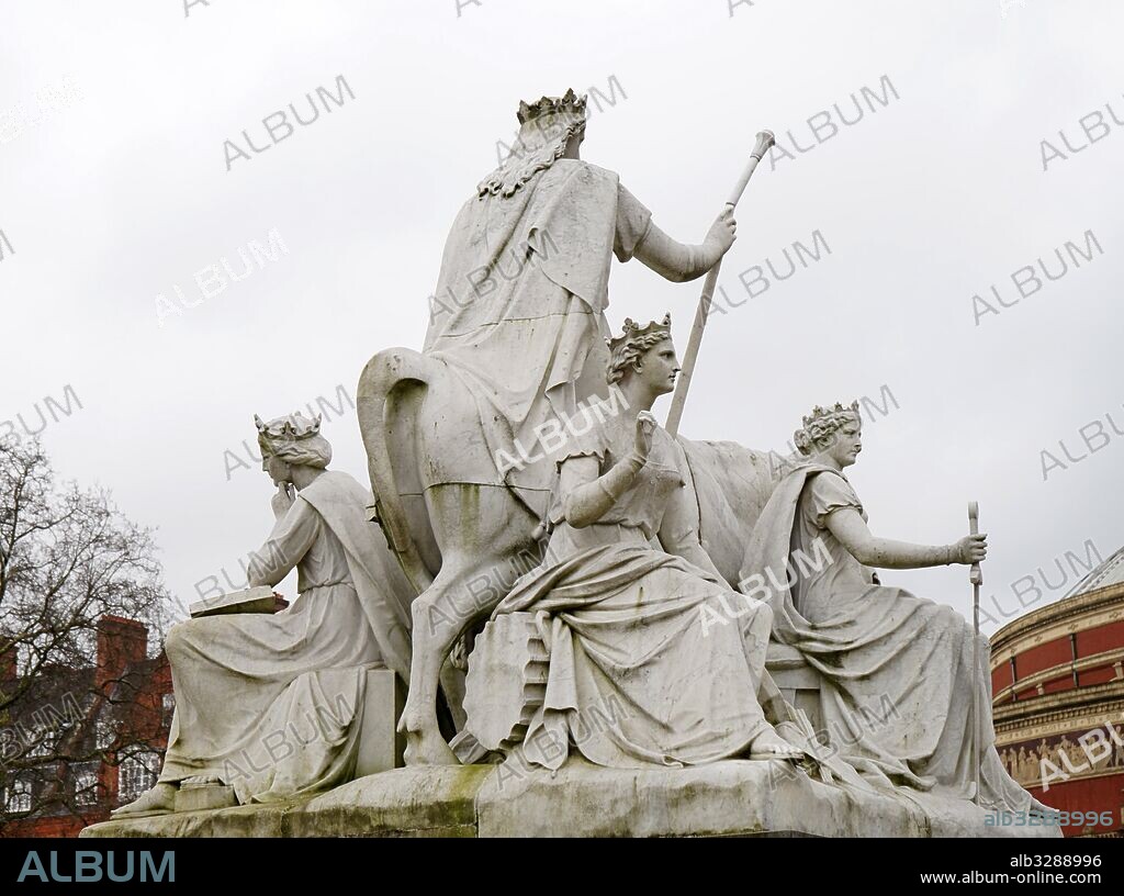 The Albert Memorial in Kensington Gardens, London. Commissioned by Queen Victoria in memory of her beloved husband, Prince Albert who died of typhoid in 1861. The memorial was designed by Sir George Gilbert Scott in the Gothic Revival style. Opened in July 1872 by Queen Victoria.