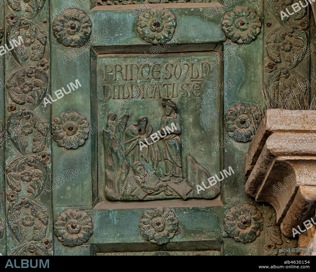 Monreale Cathedral, the gate by Bonanno Pisano (1185-6): bronze tile depicting "The Descent to the Limbo" (scene of the New Testament).. The gate is signed "Bonanno civis pisanus". It depicts five scenes of the Old Testament at the bottom, starting with Adam and Eve, and five scenes of the New Testament at the top, ending in "Christ and Mary in the glory of Paradise".