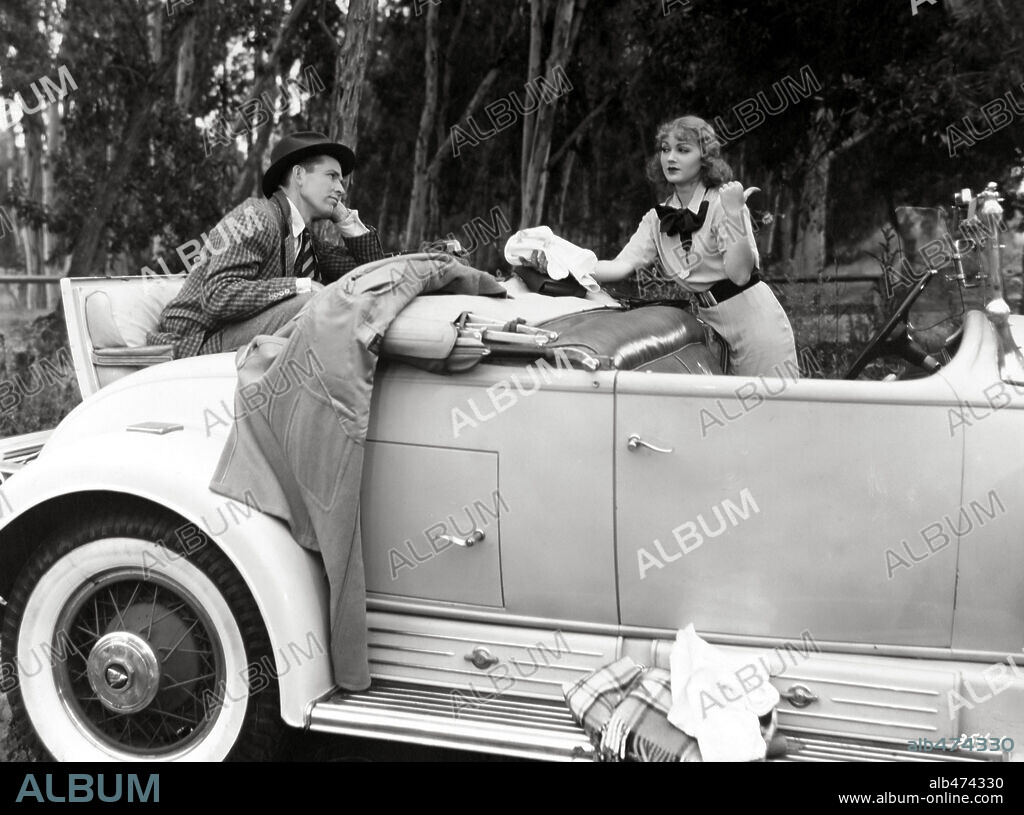 BRUCE CABOT and GRACE BRADLEY in REDHEAD, 1934, directed by MELVILLE W. BROWN. Copyright MONOGRAM PICTURES.