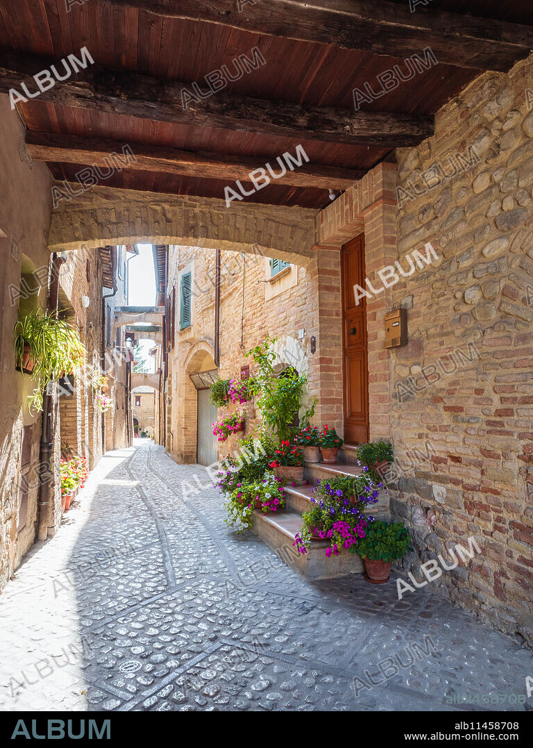 A typical colorful street in Montefalco's old town, Montefalco, Umbria, Italy, Europe.