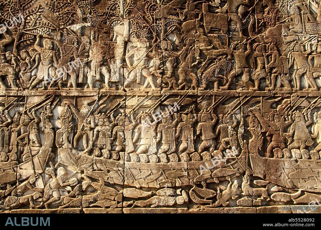 The Bayon was originally the official state temple of the Mahayana Buddhist King Jayavarman VII. The Bayon, at the centre of Angkor Thom (Great City), was established in the 12th century by King Jayavarman VII. Angkor Thom, meaning ‘The Great City’, is located one mile north of Angkor Wat. It was built in the late 12th century CE by King Jayavarman VII, and covers an area of 9 km², within which are located several monuments from earlier eras as well as those established by Jayavarman and his successors. It is believed to have sustained a population of 80,000-150,000 people. At the centre of the city is Jayavarman's state temple, the Bayon, with the other major sites clustered around the Victory Square immediately to the north. Angkor Thom was established as the capital of Jayavarman VII's empire, and was the centre of his massive building programme. One inscription found in the city refers to Jayavarman as the groom and the city as his bride. Angkor Thom seems not to be the first Khmer capital on the site, however, as Yasodharapura, dating from three centuries earlier, was centred slightly further northwest. The last temple known to have been constructed in Angkor Thom was Mangalartha, which was dedicated in 1295. In the following centuries Angkor Thom remained the capital of a kingdom in decline until it was abandoned some time prior to 1609.