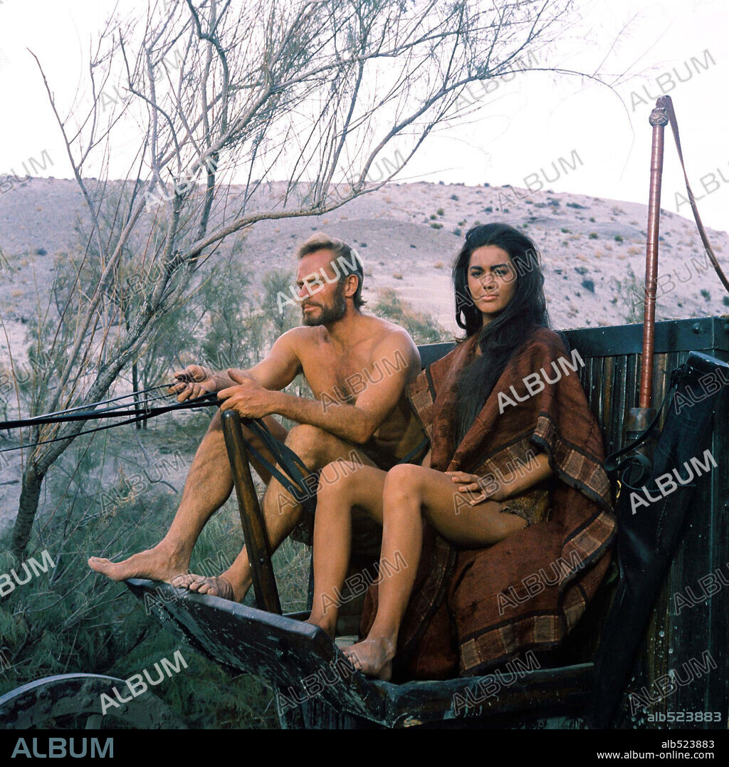 CHARLTON HESTON and LINDA HARRISON in PLANET OF THE APES, 1968, directed by FRANKLIN J. SCHAFFNER. Copyright 20TH CENTURY FOX.