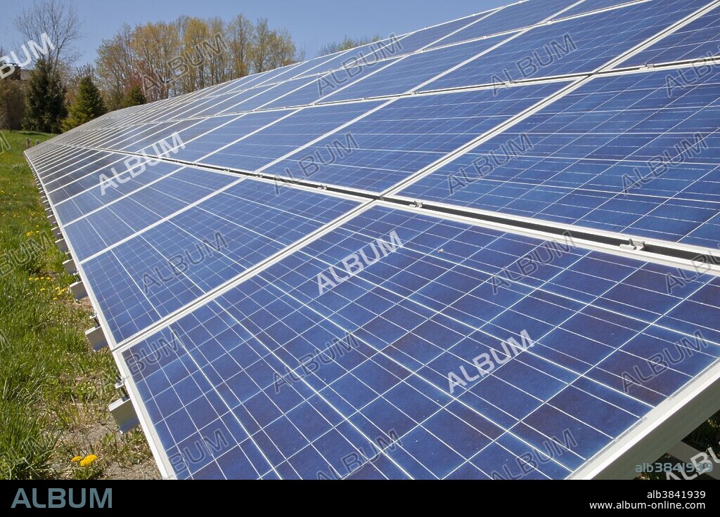 Solar panels in a field in Maine, USA.