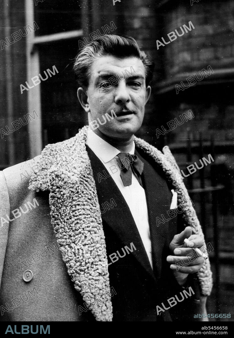 Raymonds give name promise -- Raymond, TV's Mr. Teasy Weasy, went to the High Court yesterday to claim other hairdressers are cashing in on his name.
He left the luxurious fripperies of his West End salon for the cold austerity of the Fifth Chancery Court, dressed in grey back-pleated overcoat with a grey Astrakhan collar, draped single - breasted junior navy suit, floppy red bow tie, and pleated white shirt.
And he sported a new hairstyle for men-brushed back on both sides without a parting.
His counsel, Sir Hartley Shawcross, told the court that two of them had given certain assurances which satisfied his client.
Raymond, aged 41, is seeking injunctions against the other two to restrain them from trading under a title which might lead to confusion between their businesses and his. March 26, 1954.
