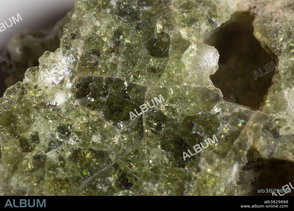 Trinitite, also known as atomsite or Alamogordo glass, is the glassy residue left on the desert floor after the plutonium-based Trinity nuclear bomb test on July 16, 1945, near Alamogordo, New Mexico. The glass is primarily composed of arkosic sand composed of quartz grains and feldspar that was melted by the atomic blast. Trinitite is mildly radioactive but is safe to handle for short periods of time.