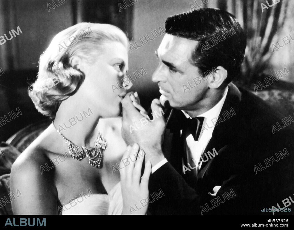 CARY GRANT and GRACE KELLY in TO CATCH A THIEF, 1955, directed by ALFRED HITCHCOCK. Copyright PARAMOUNT PICTURES.