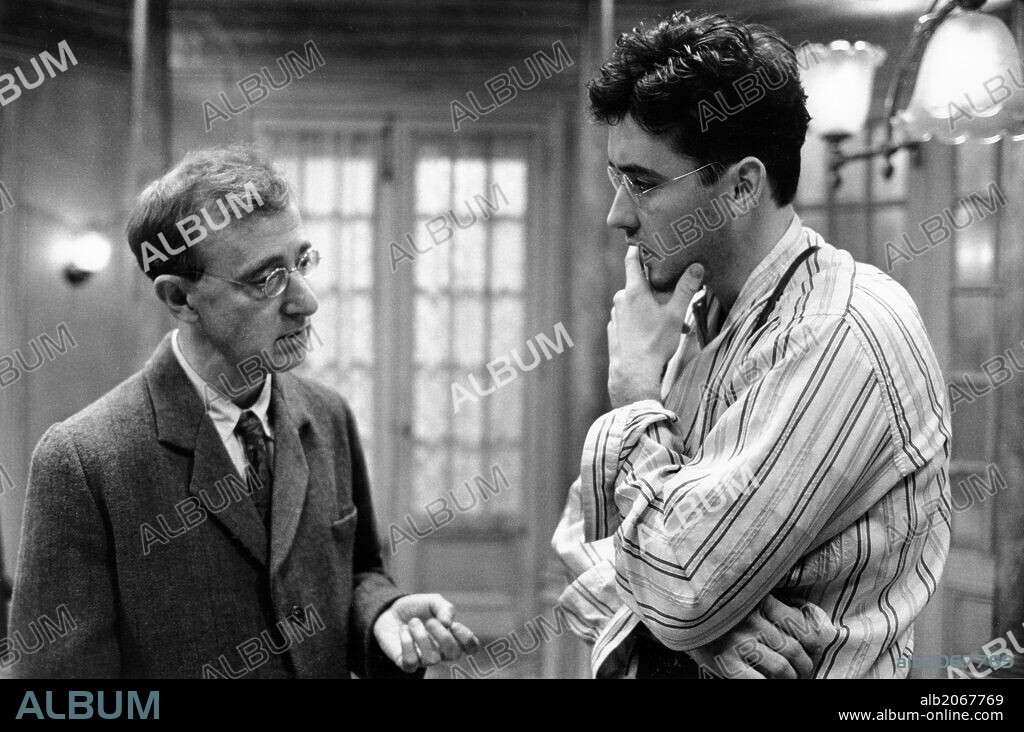 JOHN CUSACK and WOODY ALLEN in SHADOWS AND FOG, 1992, directed by WOODY ALLEN. Copyright ORION PICTURES.