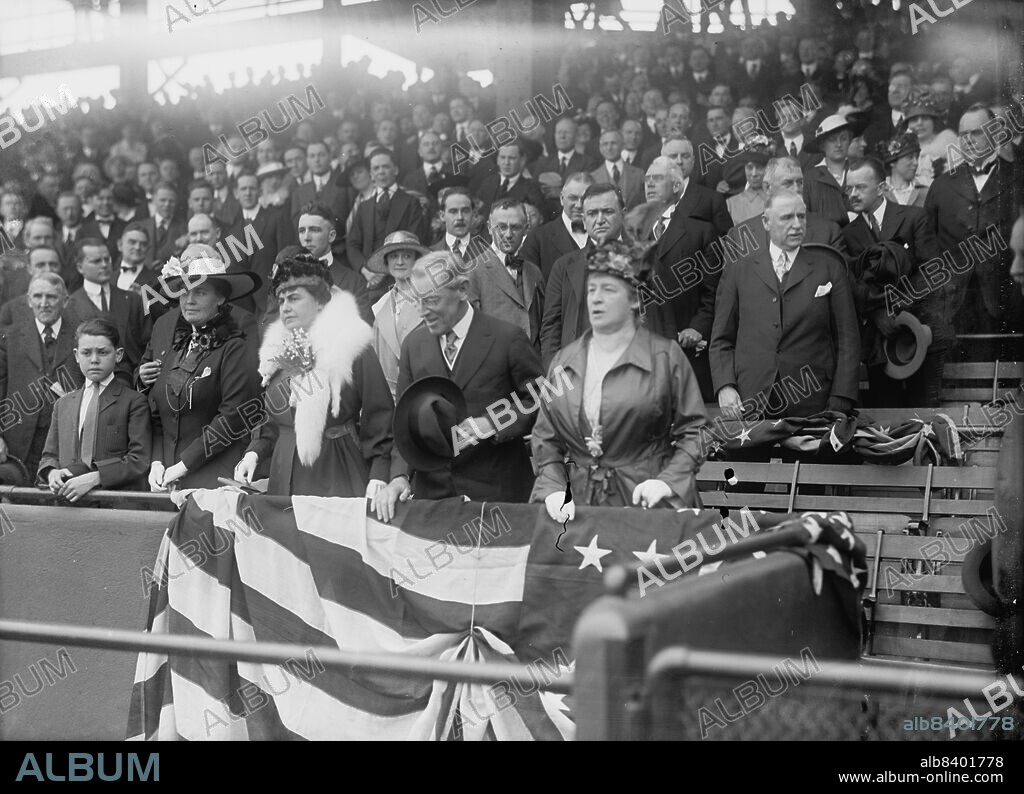 HARRIS & EWING. President Woodrow Wilson and wife Ellen Axson Wilson [sic], Mrs. Willoughby S Chesley, Baseball, 1917. US president Wilson's second wife, Edith, is to his right, wearing a fox fur.