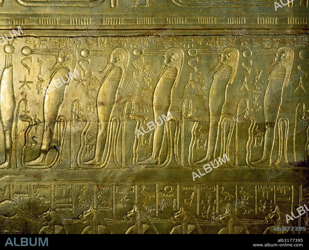 Details from Tutankhamun's shrine in the form of the second sactuary of the South (Per-Wer). Gods of the underworld from the "Book of the Dead" . Country of Origin: Egypt. Culture: Ancient Egyptian. Date/Period: 18th dynasty c.1357 - 1349 BC. Material/ Size: Gold gilded wood L=3.4m W=1.92m H=2.15m. Place of Origin: Thebes, Valley of the Kings. Credit Line: Werner Forman Archive/ Egyptian Museum, Cairo. Location: 44.