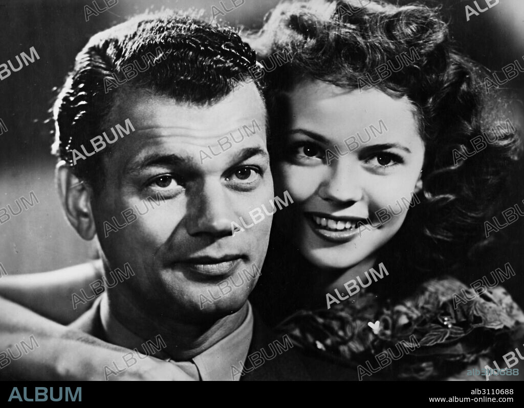 JOSEPH COTTEN and SHIRLEY TEMPLE in SINCE YOU WENT AWAY, 1944, directed by JOHN CROMWELL. Copyright UNITED ARTISTS.