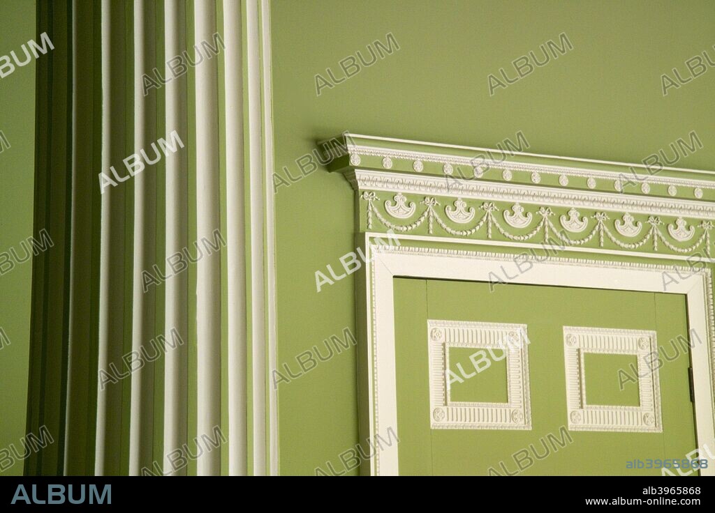 Interior detail, Audley End House, Saffron Walden, Essex, 2007. Decorative door frame and pillar in the dining parlour.