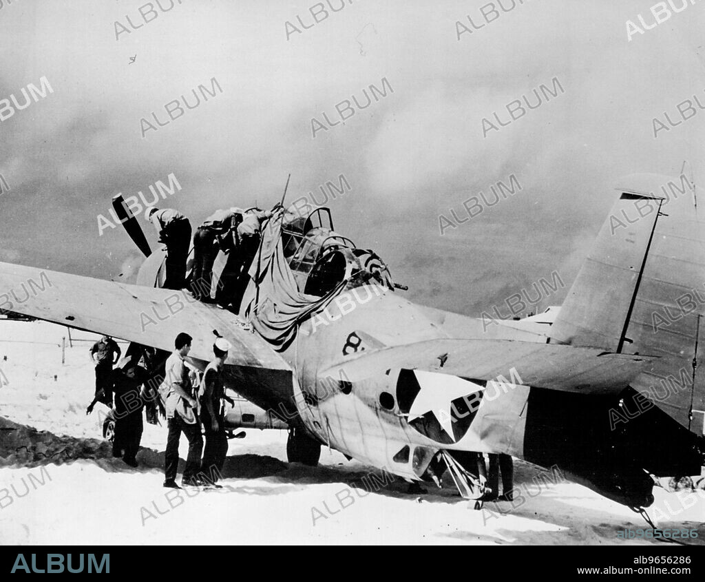 Avengers Can Take Punishment.During the battle of Midway, Grumman Torpedo Bombers, called Avengers, fought until disabled and returned to Midway to land. This Avenger, although badly shot up, made home, safely under it's own power. Thus is indicated their great stamina and structural strength. September 18, 1942. (Photo by Official Navy Photo).