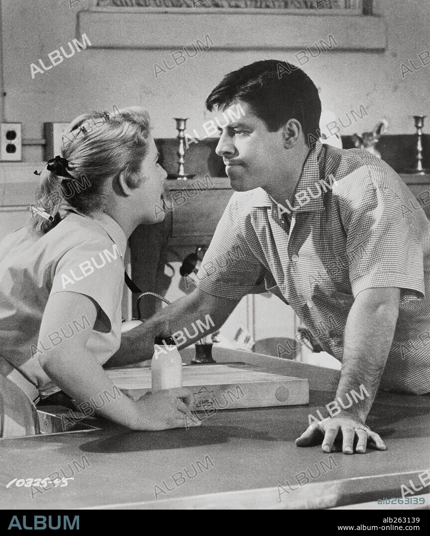 JERRY LEWIS and MARILYN MAXWELL in ROCK-A-BYE BABY, 1958, directed by FRANK TASHLIN. Copyright PARAMOUNT PICTURES.