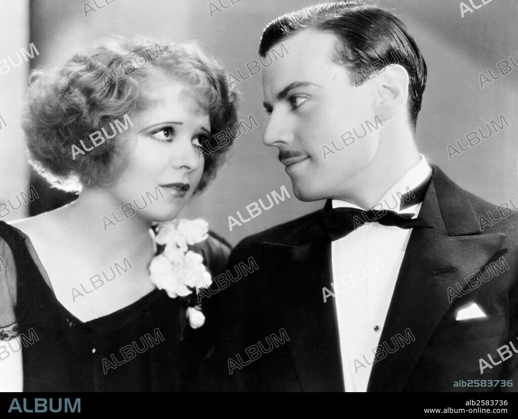 CLARA BOW and NORMAN FOSTER in NO LIMIT, 1931, directed by FRANK TUTTLE. Copyright PARAMOUNT PICTURES.