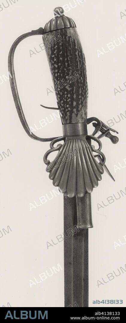 Hunting Sword combined with Flintlock Pistol. English. Date: 1725. Dimensions: L. 81.2 cm (32 in.)
Blade L. 67.5 cm (26 5/8 in.)
Wt. 1 lb. 9 oz. Steel, brass, and horn. Origin: England.