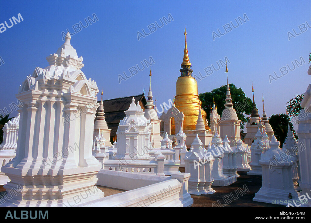 Wat Suan Dok (Flower Garden Temple) was founded by King Kue Na of Lanna for the monk Sumana Thera in the year 1370 CE. The temple was built in the centre of Wiang Suan Dok, a walled settlement of the Lawa people older than Chiang Mai itself. Chiang Mai, sometimes written as 'Chiengmai' or 'Chiangmai', is the largest and most culturally significant city in northern Thailand, and is the capital of Chiang Mai Province. It is located 700 km (435 mi) north of Bangkok, among the highest mountains in the country. The city is on the Ping river, a major tributary of the Chao Phraya river. King Mengrai founded the city of Chiang Mai (meaning 'new city') in 1296, and it succeeded Chiang Rai as capital of the Lanna kingdom. The ruler was known as the Chao. The city was surrounded by a moat and a defensive wall, since nearby Burma was a constant threat. Chiang Mai formally became part of Siam in 1774 by an agreement with Chao Kavila, after the Thai King Taksin helped drive out the Burmese. Chiang Mai then slowly grew in cultural, trading and economic importance to its current status as the unofficial capital of northern Thailand, second in importance only to Bangkok.