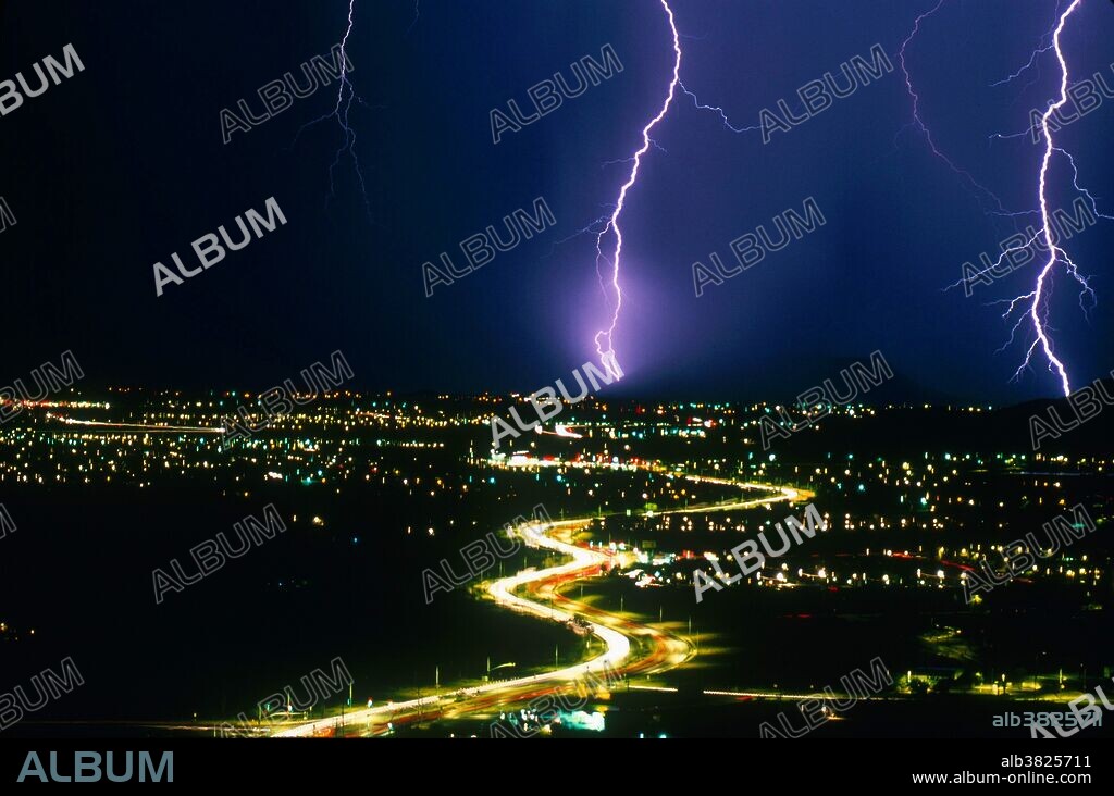 Multiple cloud-to-Ground lightning, with dendrite branches, over Tucson, Arizona.
