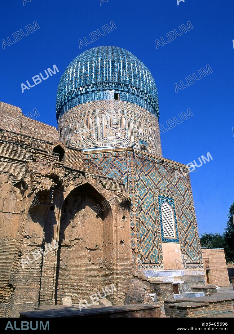 The Gur-e Amir or Guri Amir (Persian: ???? ????) is the mausoleum of the Asian conqueror Tamerlane (also known as Timur) in Samarkand, Uzbekistan. It occupies an important place in the history of Persian Architecture as the precursor and model for later great Mughal architecture tombs, including Humayun's Tomb in Delhi and the Taj Mahal in Agra, built by Timur's descendants, the ruling Mughal dynasty of North India. It has been heavily restored. Gur-e Amir is Persian for 'Tomb of the King'. This architectural complex with its azure dome contains the tombs of Tamerlane, his sons Shah Rukh and Miran Shah and grandsons Ulugh Beg and Muhammad Sultan. Also honoured with a place in the tomb is Timur's teacher Sayyid Baraka.