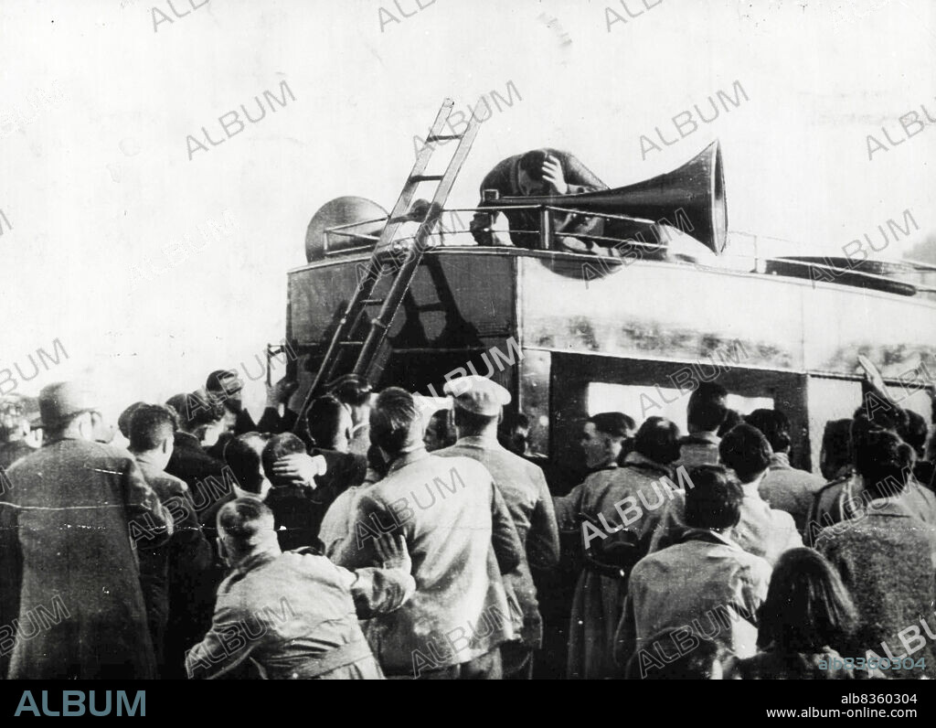 British Fascist Leader ***** Falls Unconscious:Sir Oswald Mosley falls after being struck by a stone.Sir Oswald Mosley, the Fascist leader, climbed on a van at Liverpool yesterday afternoon to address a meeting. Answering jeers from the crowd with a wave of his hand, and just about to begin his speech, he fell unconscious. A large jagged stone one of many, had struck him on the temple. Members of his party rushed to his aid and with blood streaming from the would he was taken by ambulance to hospital. October 22, 1937. (Photo by Kosmos Press Bureau (Aust.)).