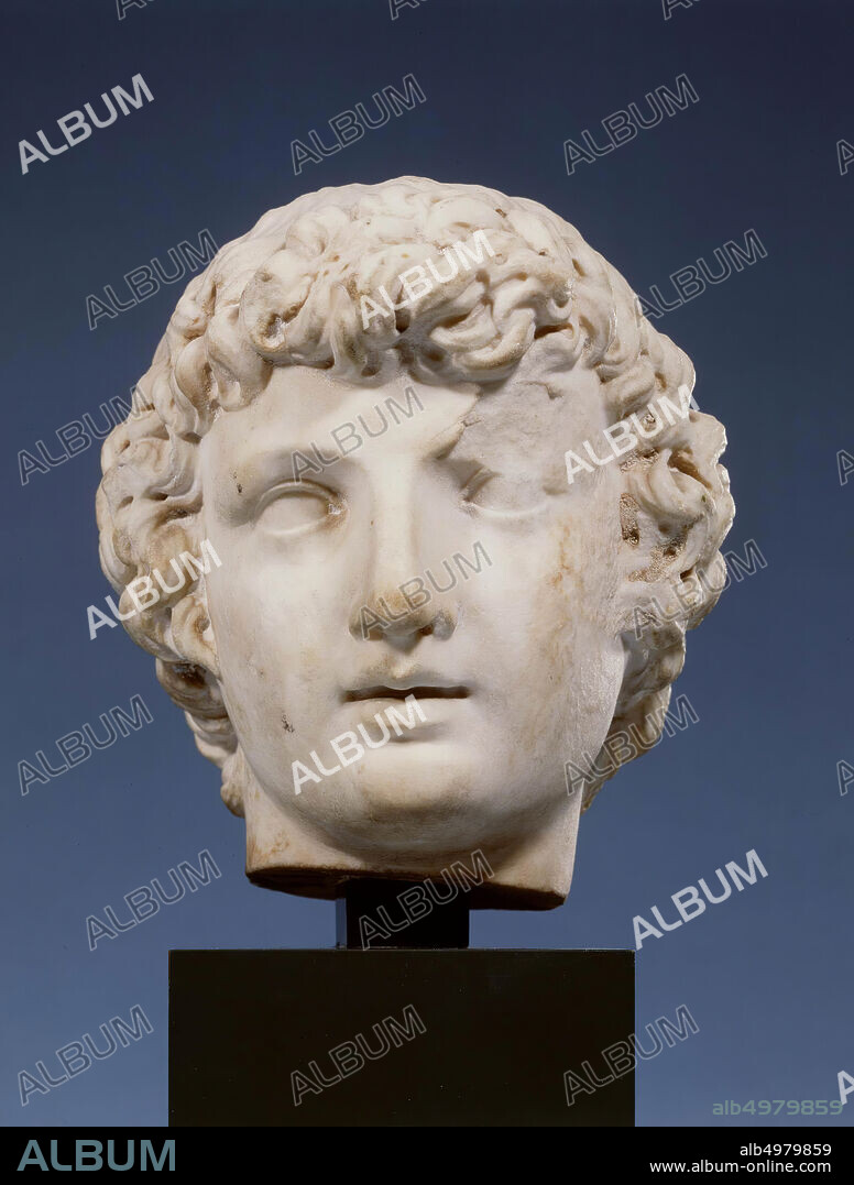 The treatment of eyebrows, nose and mouth recalls classic Greek examples. This and the full cheeks, and also the haircut, connect the cup to examples from the time of Hadrian., Head, man's head, marble, 18.6 cm, imperial time 125-150 AD, unknown.