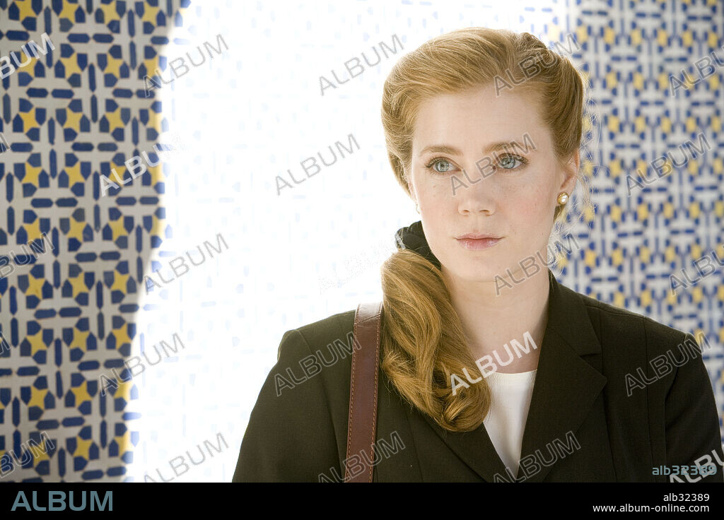 AMY ADAMS in CHARLIE WILSON'S WAR, 2007, directed by MIKE NICHOLS. Copyright GOOD TIME CHARLIE PRODUCTIONS/UNIVERSAL PICTURES/PLAYTONE.