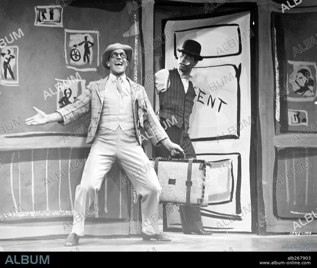 GENE KELLY in SINGIN' IN THE RAIN, 1952, directed by GENE KELLY and STANLEY DONEN. Copyright M.G.M.
