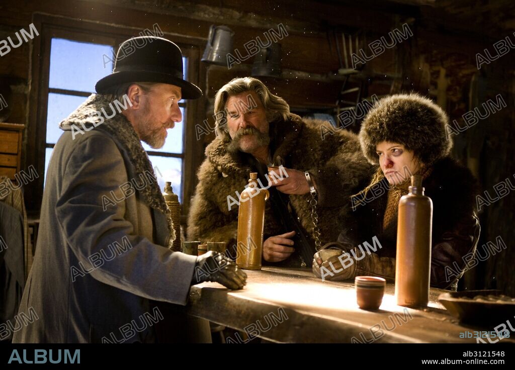 JENNIFER JASON LEIGH, KURT RUSSELL and TIM ROTH in THE HATEFUL EIGHT, 2015, directed by QUENTIN TARANTINO. Copyright WEINSTEIN COMPANY, THE.