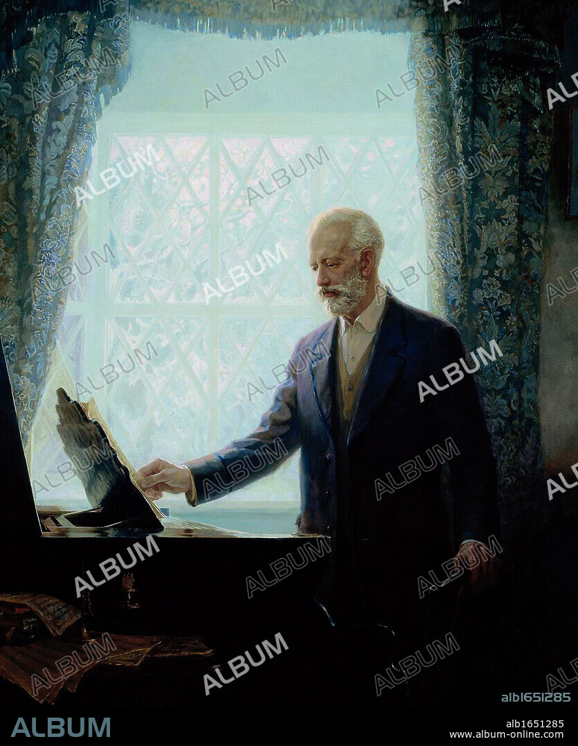 Peter Ilich Tchaikovsky (1840-1893), Russian composer.  Portrait of Tchaikovsky standing by a piano looking at a score on the music stand.  Music Romantic Musician.