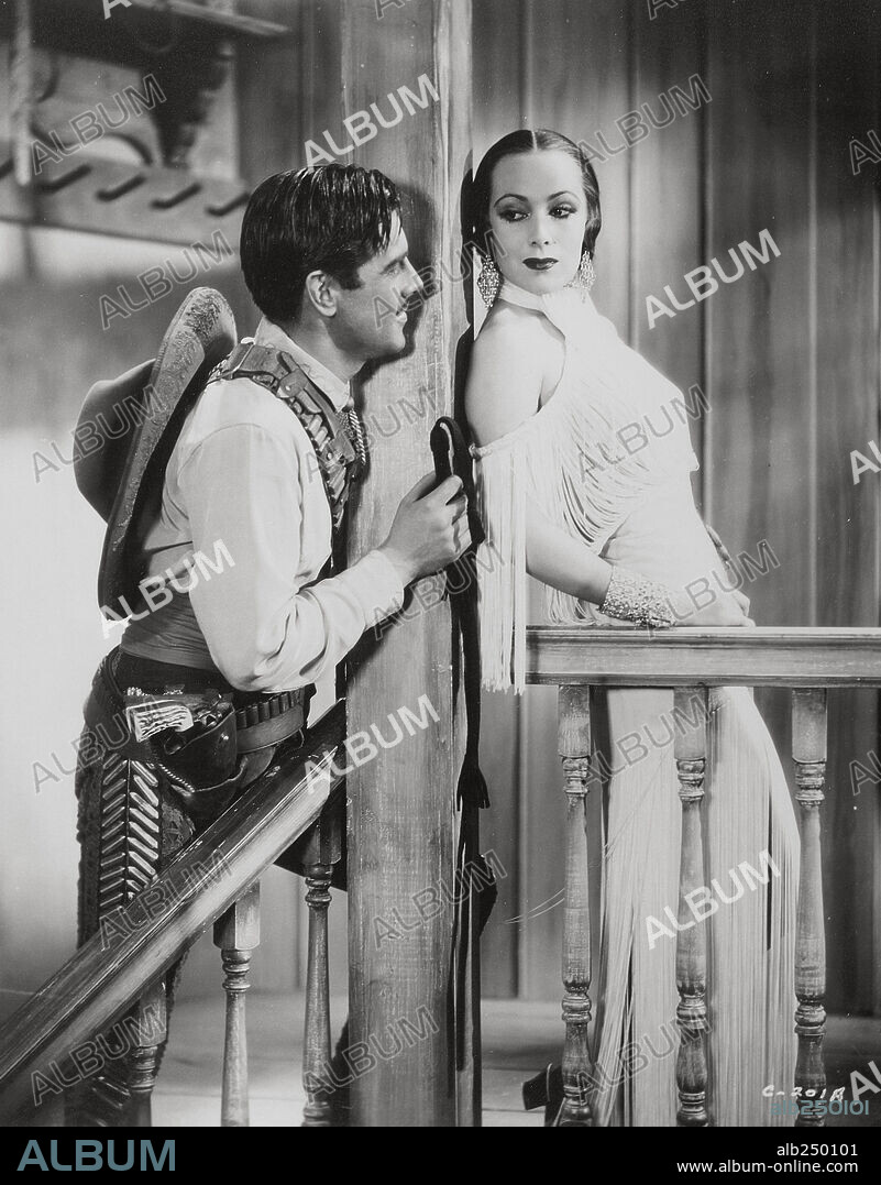 DOLORES DEL RIO and PHIL REGAN in IN CALIENTE, 1935, directed by LLOYD BACON. Copyright WARNER BROTHERS.