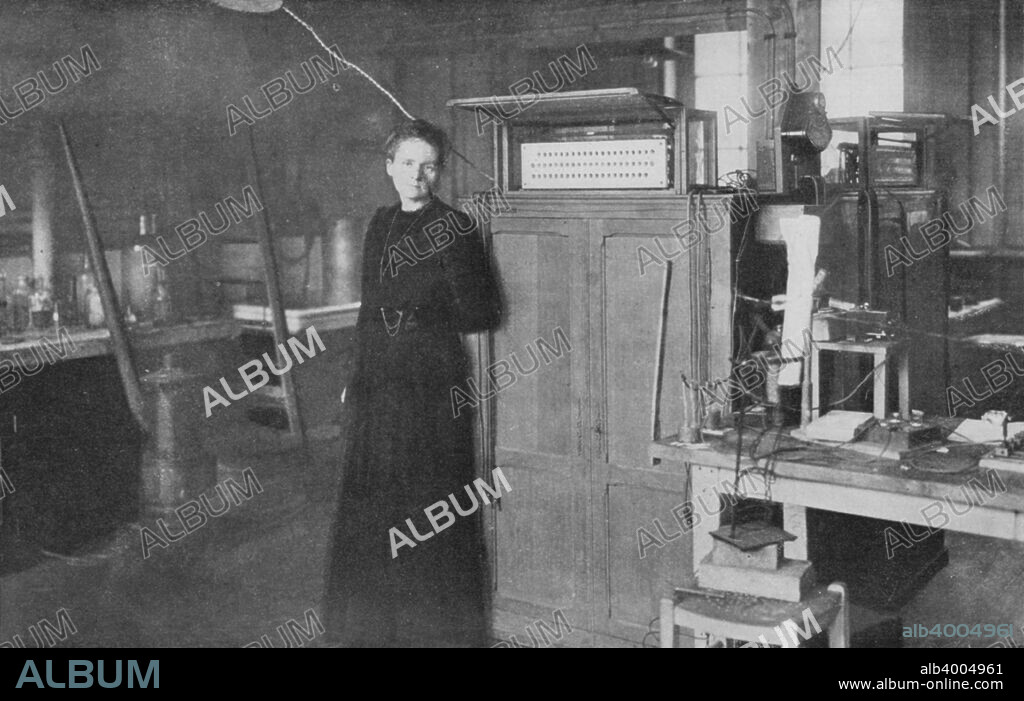 Marie Curie, Polish-born French physicist, in her laboratory, 1912. Marie (1867-1934) and her husband Pierre Curie continued the work on radioactivity started by Henri Becquerel. In 1898, they discovered two new elements, polonium and radium. Marie did most of the work of producing these elements, and to this day her notebooks are still too radioactive to use. She went on to become the first woman to be awarded a doctorate in France, and continued her work after Pierre's death in 1906. In 1903 the Curies shared the Nobel Prize for Physics with Becquerel. Marie won a second Nobel Prize, for chemistry, in 1911.