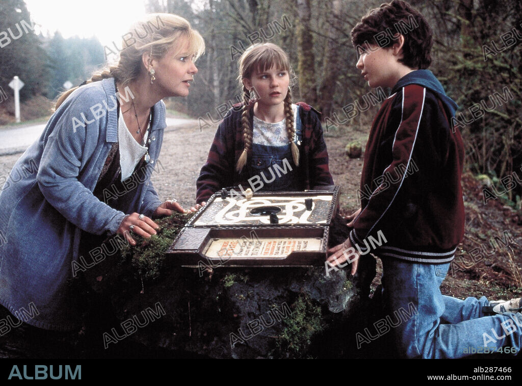 BONNIE HUNT, BRADLEY PIERCE et KIRSTEN DUNST dans JUMANJI, 1995, réalisé par JOE JOHNSTON. Copyright COLUMBIA TRI STAR / McEWAN, ROB.