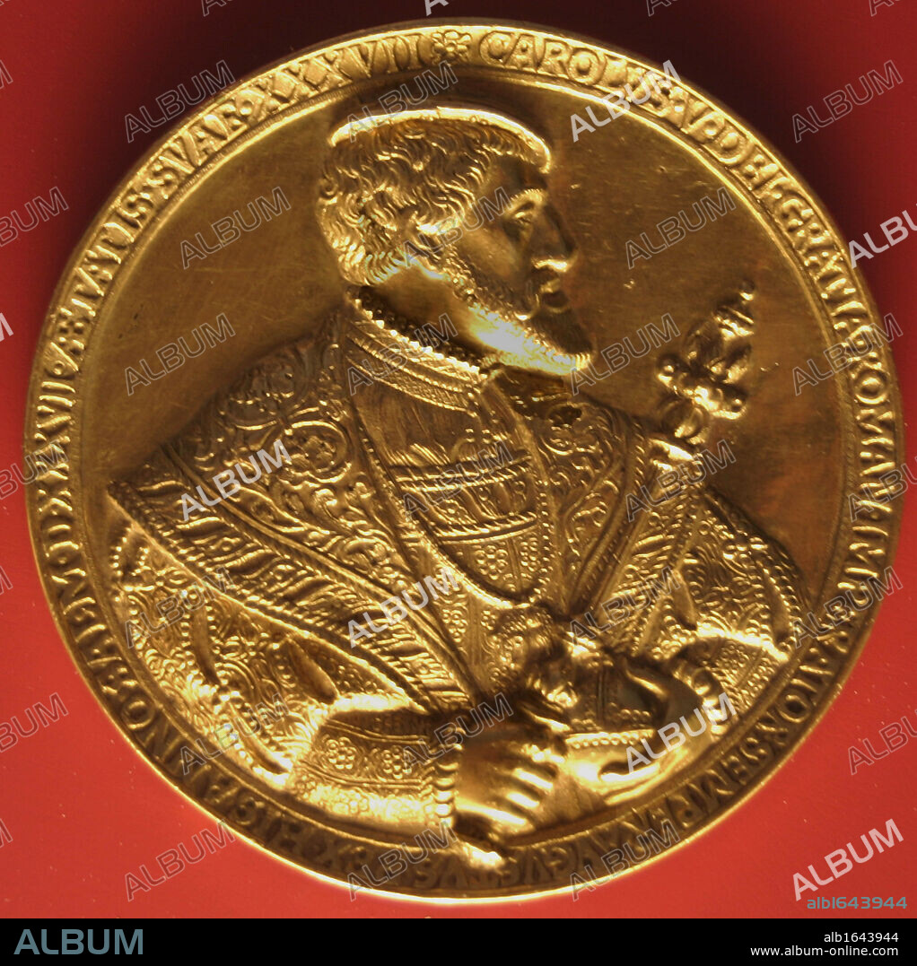 Charles V depicted on a gold coin. (Carlos I, Carlos V or Carlos I de Espana), 1500 - 1558)ruler of the Holy Roman Empire from 1519 and, as Carlos I of Spain, of the Spanish Empire from 1516 until his abdication in 1556.