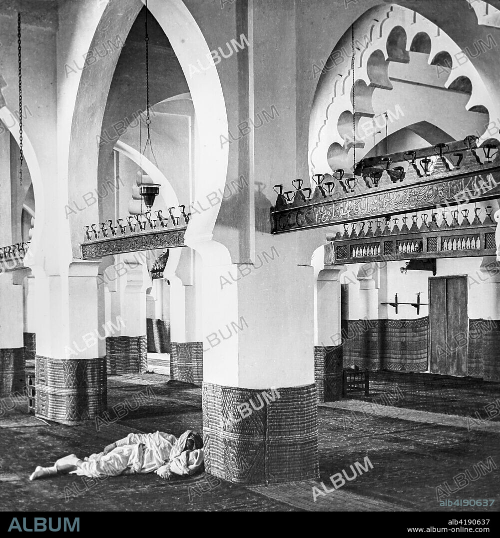 Interior of the Great Mosque of Algiers, Djamaa el Kebir, and a man sleeping on the floor;Algiers, Algeria.
