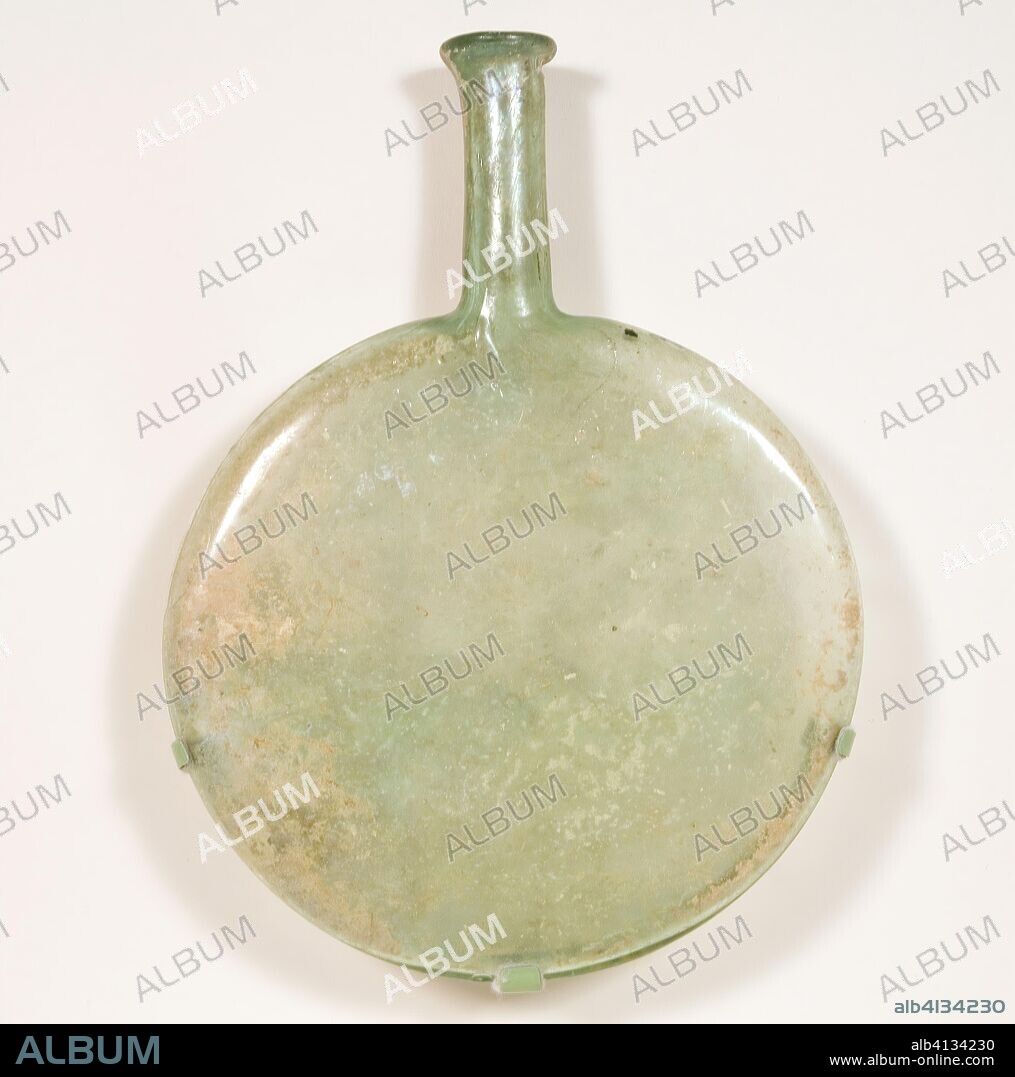 Flat Flask. Byzantine; Eastern Mediterranean. Date: 401 AD-600 AD. Dimensions: 23 × 17.1 × 2.8 cm (9 × 6 3/4 × 1 1/8 in.). Glass, blown technique. Origin: Byzantine Empire.