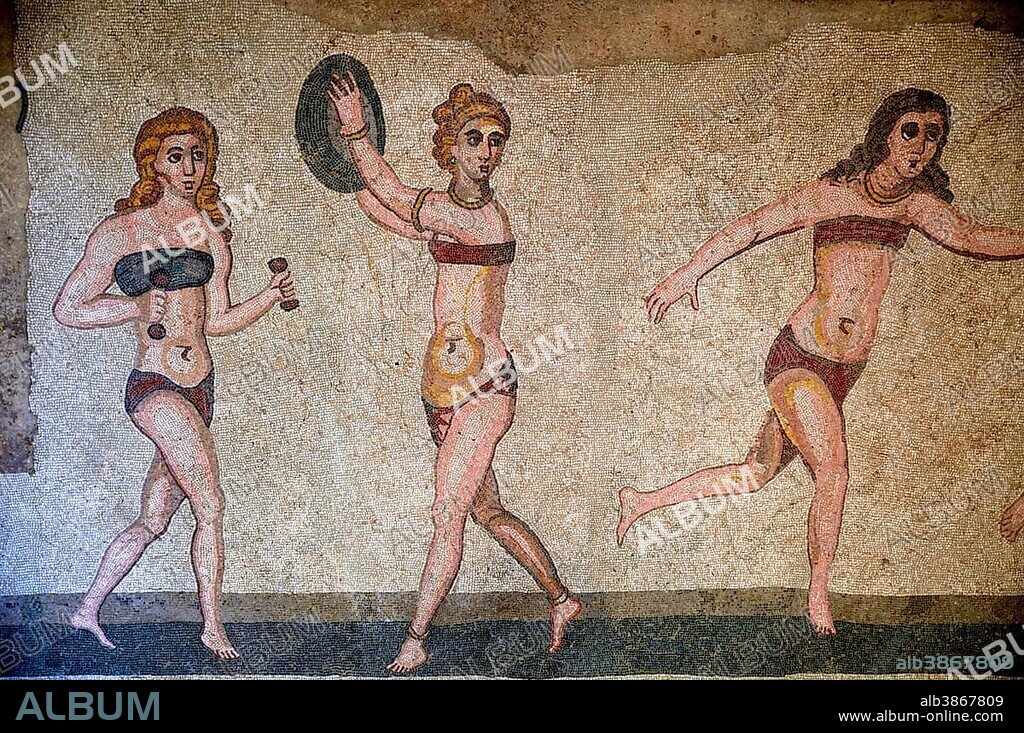 Floor mosaic of three women in bikini during sports, Bikini Girls' Hall, Villa Romana del Casale, 4th century AD Roman villa, Piazza Armerina, Enna Province, Sicily, Italy