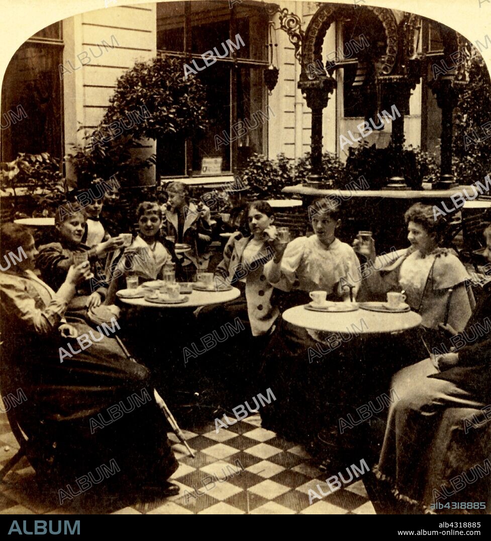 BERT UNDERWOOD. 'Refreshing - Unter den Linden Café, Berlin, Germany', 1894. Women sitting at tables, raising their glasses. Stereocard. [Strohmeyer & Wyman, New York, 1894].